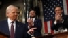 US Vice President JD Vance and Speaker of the House Mike Johnson (R-LA) applaud as US President Donald Trump speaks during an address to a joint session of Congress in the House Chamber of the US Capitol in Washington, DC, on March 4, 2025. (Photo by Win 