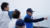 Rafael Mariano Grossi mendengarkan penjelasan dari Tomoaki Kobayakawa, Presiden Tokyo Electric Power Co., saat mengunjungi pembangkit listrik tenaga nuklir Fukushima yang rusak di Futaba, Jepang, 5 Juli 2023. (Hiro Komae/Pool via Reuters)
