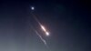 Sejumlah objek terlihat di langit di atas Yerusalem setelah Iran meluncurkan pesawat nirawak dan rudal ke arah Israel, di Yerusalem, 14 April 2024. (Foto: Reuters)