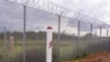 FILE - The Latvia/Belarus border near Krivanda, Eastern Latvia, is pictured on Aug. 8, 2023. Estonia, Latvia and Lithuania agreed Jan. 19, 2024, to construct new installations on their borders over the coming years to deter military threats.