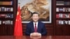 中共官媒新华社发布照片显示，中国领导人习近平在北京发表新年贺词。（2023年12月31日）