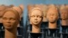 Sculptures created by French artist Prune Nourry representing the approximately100 Chibok schoolgirls still in captivity are displayed in Lagos, Nigeria, Dec. 13, 2022. 