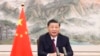 中国新华社发布的照片显示，2022年4月21日星期四，中国国家主席习近平在海南省博鳌举行的博鳌亚洲论坛开幕式上发表视频讲话。