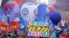 Protesters rally against the French government's pension reform plan, in Paris, Feb. 7, 2023.