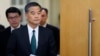 FILE - Hong Kong Chief Executive Leung Chun-ying arrives at a news conference which was held as part of the National People's Congress, the country's parliament, in Beijing, March 6, 2015.