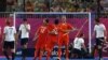Great Britain's players react as Netherlands' Billy Bakker (3rd R) with team mates celebrates scoring a goal during their men's semifinal hockey match at the Riverbank Arena at the London 2012 Olympic Games August 9, 2012. REUTERS/Suzanne Plunkett (BRITAI