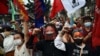 Filipino activists hold a rally in observance of Human Rights Day, in Manila, Philippines, Dec. 10, 2020.