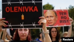 Фото: акція протесту в Києві, 30 липня 2022 року REUTERS/Валентин Огіренко