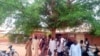 Parents of abducted children of the Salihu Tanko Islamic School wait for news on their children in Tegina, Nigeria, June 1, 2021. A number of students were abducted Sunday and one person was killed at a school in Nigeria's north central Niger State.