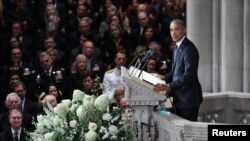Former U.S. president Barack Obama speaks at a memorial service for the late Senator John McCain, at National Cathedral in Washington, Sept. 1, 2018.
