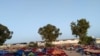 After the detention center was bombed, remaining structures appeared unstable and five days later, migrants were still sleeping outdoors. Pictured and transmitted to VOA July 7, 2019, in Tripoli, Libya. 