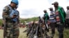 United Nations peace keepers record details of weapons recovered from the Democratic Forces for the Liberation of Rwanda (FDLR) militants after their surrender in Kateku, a small town in eastern region of the Democratic Republic of Congo (DRC), May 30, 20