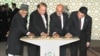 In this photograph released by the Press Information Bureau (PIB) on December 13, 2015, Indian Vice President, Hamid Ansari (L), along with President of Turkmenistan, Gurbanguly Berdimohamedov (R), President of Afghanistan, Ashraf Ghani (2R) and Prime Minister of Pakistan, Nawaz Sharif press the button to begin the welding process of the TAPI Gas Pipeline in Mary, capital of south eastern Mary province. 