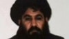 FILE- Mullah Akhtar Mohammad Mansour, Taliban militants' leader, is seen in this undated handout photograph by the Taliban. After days of widespread reports that he had been seriously wounded in a gunfight with rival militant commanders, the Islamist insurgency released a voice message from its chief to prove he is alive.