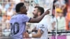 FILE - Real Madrid's Vinicius Junior, left, confronts Valencia fans as Valencia's Jose Luis Gaya reacts during a Spanish La Liga soccer match between Valencia and Real Madrid, at Mestalla stadium in Valencia, Spain, May 21, 2023.
