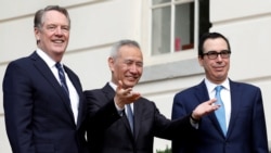 VOA Asia - A partial trade deal is ready for signing