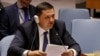 Ukraine's Deputy UN Ambassador Oleksandr Pavlichenko addresses the U.N. Security Council as they meet to discuss the humanitarian situation in Ukraine, Aug. 5, 2014.