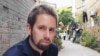 This undated photo at an undisclosed location provided to AFP by the 'Chinese Urgent Action Working Group' shows Swedish human rights activist Peter Dahlin. 